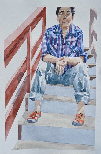 A person sitting on a staircase