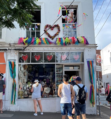 Photo of SMART,Alec hatters decorated in rainbow colours and symbols