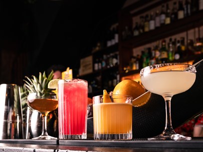 Cocktails lined up on the Sixty Smith bar