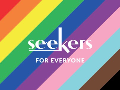 Rainbow background with text 'Seekers for everyone'.