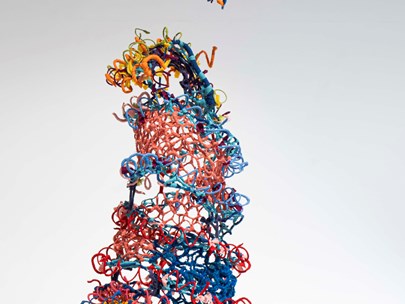 Sculpture made with a lot of coloured plastic string-like coils
